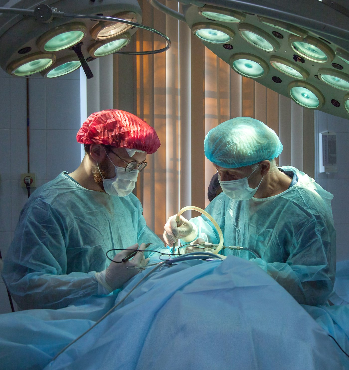Clinicians focused during a procedure
